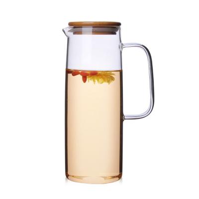 China Wholesale Price Large Capacity Viable Glass Kettle With Wooden Lid For Juice Lemon Water Iced Tea Glass Jug For Ice Tea for sale