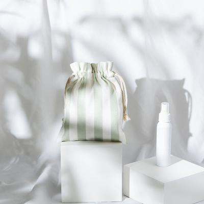 China Custom Eco-Friendly Stripe Eco-Friendly Green White Fabric Eco-Friendly Bamboo Fiber Drawstring Bag For Cosmetic for sale