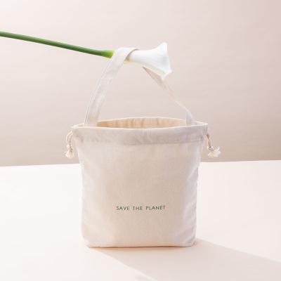 China Wholesale Custom Recycled Cotton Hemp Canvas Single Hand Favor Natural Recycled Cosmetic Drawstring Bag for sale