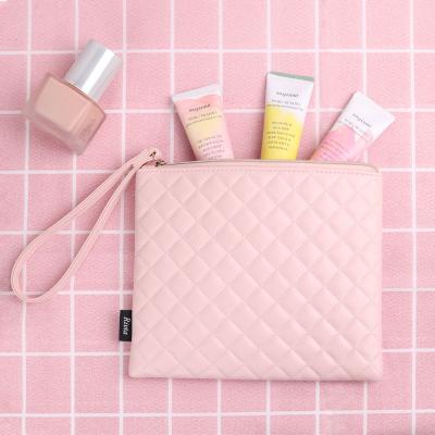 China Custom Portable Leather Clutch Makeup Tool PU Leather Pink Waterproof Quilted Cosmetic Bag With Handle for sale