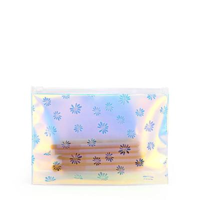 China Custom Plastic Holographic Transparent Flat Floral PVC TPU Clear Cosmetic Bag Waterproof Dustproof Shockproof Toiletry Bag Organizer With Zipper for sale