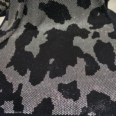 China Custom Bling Bling Crystals SS10 Soft Touch Stretch Rhinestone Leopard Pattern Design Diamond Fabric For Dress Dress for sale