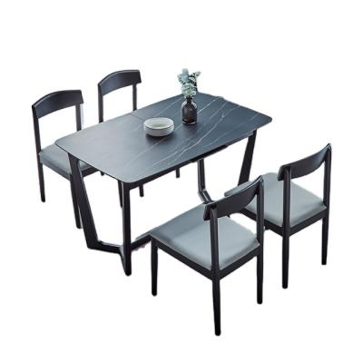 China Italian minimalist rock panel multi-functional telescopic dining table and chairs combination for sale