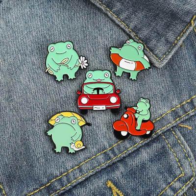 China Fashionable Cartoon Cute Student Ornaments Frog Car Covers Brooch Drop Enamel Frog Guitar Brooch Wholesale Wholesale for sale