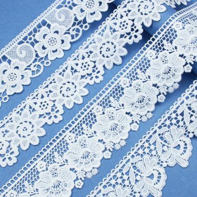 China Free Sample Viable White Border Guipure Lace Trim Polyester Milk Fiber Embroidery Lace Trim For Apparel for sale