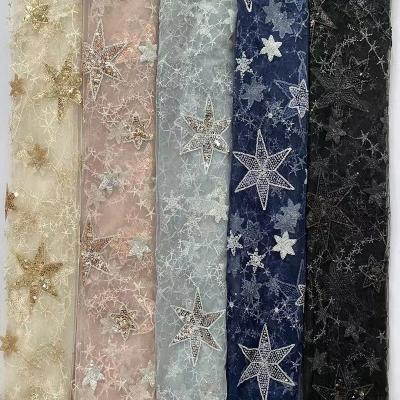 China New Design Sustainable Lolita Sequin Star Mesh Material Embroidery Lace Fabric for sale