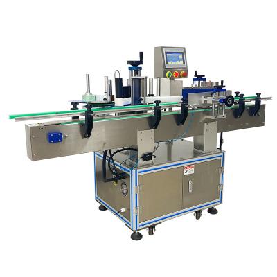 China Automatic Beverage Round Bottles Bottle Vertical Sticker Label Applicator Food Box Roll Labeling Machine for sale