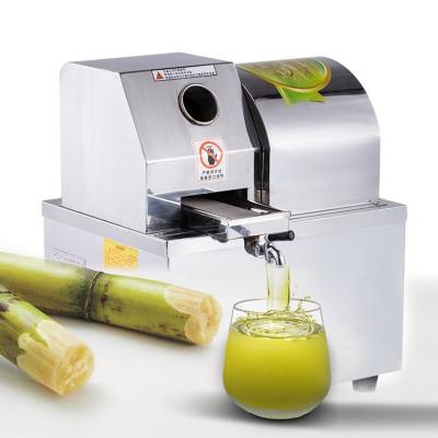 China Sugar cane extracting portable commercial electric sugar cane juice machine sugar cane juicer for sale