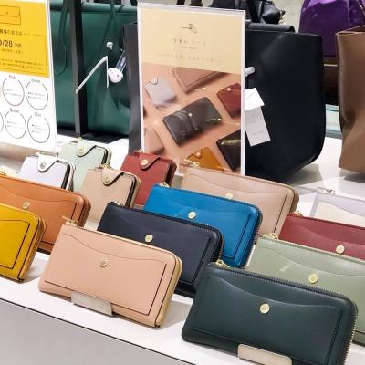 China 2023 Ladies Fashion Designer Fashion Designer Credit Card Holder Multiple Wallet Ladies Long Zipper Mobile Phone Clutch Wax Custom Purse Waterproof Leather for sale