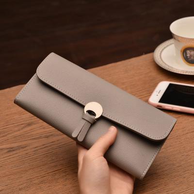 China New waterproof ladies pinch female zipper long large capacity tassel manufacturers wholesale card women business mini wallet for sale