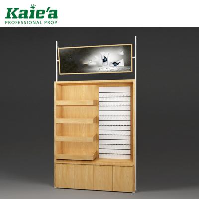 China Modern Design Retail Fashion Wooden Cosmetic Display Cabinet Beauty Store Hanging Display Stand for sale