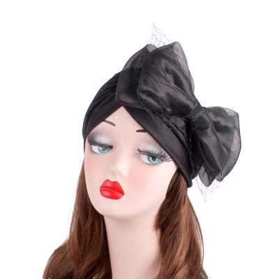 China Bow Headwrap Fashion Women Fascinator Hats Turban Headwear with Big Bowknot Veil Cocktail Wedding Party Turban Hat TJM-24K for sale