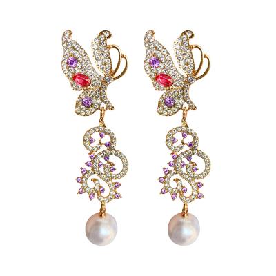 China European and American exaggerated earrings of the new S925 silver needle fashion pearl butterfly tassel long earrings temperament for sale