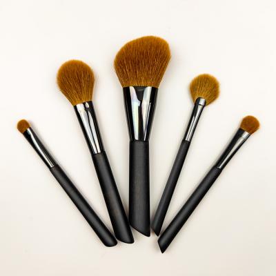 China Angular Blush High End OCM Private Label Goat Hair Black Wood Soft Wool Cosmetic Makeup Brush Set for sale