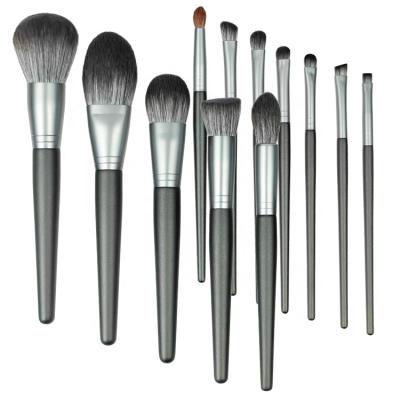 China Angular Blush OCM 12 Pcs Wooden Handle Wholesale Vegan Soft Synthetic Cosmetic Private Label Makeup Brush Set for sale