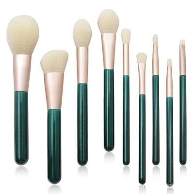 China Angular Blush Custom OCM 9pcs Private Label Logo Cosmetic Makeup Brush Set Green Wood Handle for sale