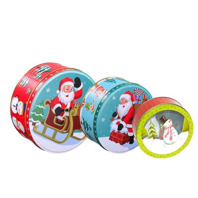 China Round Tin Cans Holiday Tin Box Sets Christmas Gift Metal Tins with Lids Printed Tin Cookie Jar Te koop