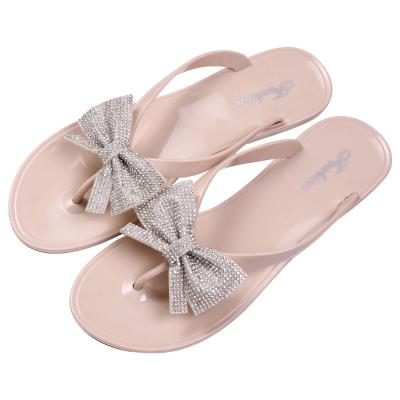 China Fashion Trend New Arrival Jelly Sandals Shoes Summer Butterfly Flat Rhinestone Flip Flops For Women for sale