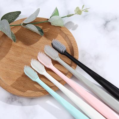 China Travel Macaron Toothbrush Hotel in Ten Packs of Pure White Extra Fine Stiffens Toothbrush Charcoal Bamboo Toothbrush Plastic Adult for sale