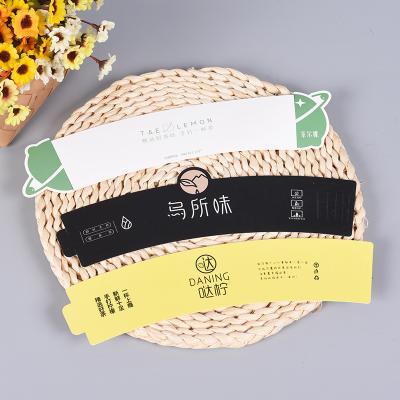 China New Wholesale Disposable Cup Sleeve Printing Disposable Paper Coffee Cup Sleeve Custom Kpop Logo for sale