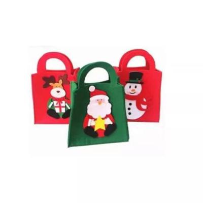 China Christmas Home Kids Gifts Supplies DIY Portable Unique Handmade Now-woven Felt Christmas Candy Bag for sale