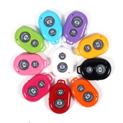 China Smart Phone Mini One-Button Auto Portable Remote Camera Remote Control Shuttle Wireless Interruption Selfie for sale