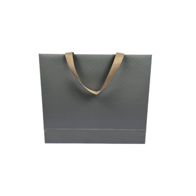 China Biodegradable Black Paper Bags With Your Own Logo Hot Stamping Custom Paper Gift Suitcase for sale