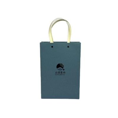 China Biodegradable custom printed paper bags fashion promotion handmade cosmetic boutique paper gift packaging bag for sale