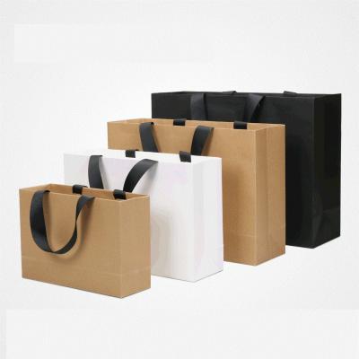 China Low MOQ Recyclable Custom Design Your Own Logo Recyclable Kraft Paper Packing Bag Carrier Bag Shopping Paper Boxes for sale