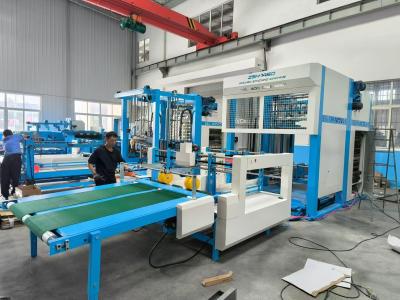 China Apagado y laminado de flauta totalmente automatizado con producción de cartón corrugado de alta velocidad y máquina de apilamiento automático en venta