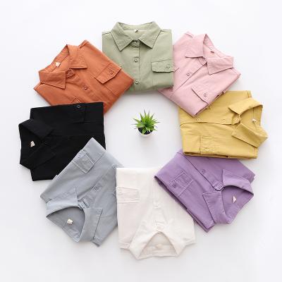 China Anti Pilling Women Pocket Blouse Loose Solid Color College Style Casual Shirts for sale