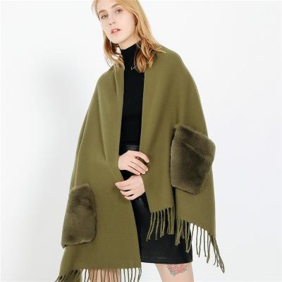 China Fashion Newest European Style Winter Warm Cashmere Pashmina Shawls Solid Color Pockets Warm Scarf With Tassels for sale