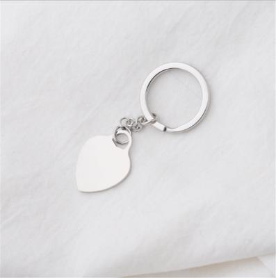 China New Fashionable Shiny Engraved Key Chain Customized Mirror Stainless Steel Exquisite Love Heart Key Chain Pendant for sale