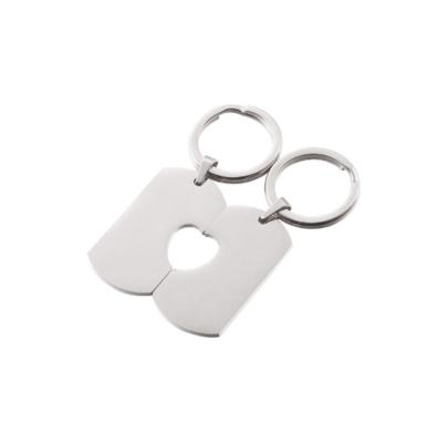 China Trendy Heart Engraved Metal Shining Couple Stainless Steel Accessories Diy Laser Key Chain Key Chain for sale