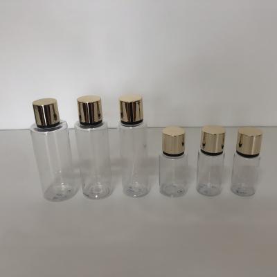 China Winner 250ML Cosmetic Winner 20mm Neck Crimp Sprayer Perfume Pet Gold Bottle With Gold Cap And PS Cap for sale