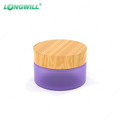 China Cosmetic One Stop Service Airtight Bamboo Lids Food Canisters Transparent Small Glass Jars Container With Extra Labels for sale