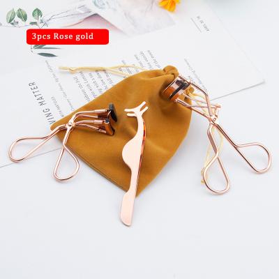 China 4-pieces Private Label Stainless Steel Eyelash Curler Rose Gold Eyelash Applicator Eyebrow Tweezers Set with Bag for sale