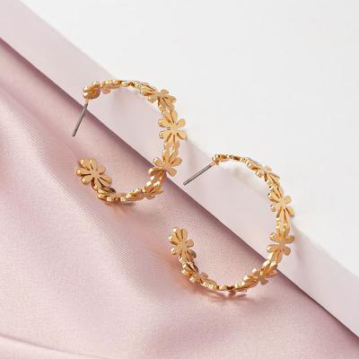 China Simple geometric c-shaped earrings of the design metal texture atmosphere of European and American women's hyperbole flower style earrings for sale