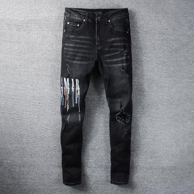 China Viable Graphic Mens Pants Mens Fashion High Street Mens Black Multicolor Letter Print Elastic Pants Hip Hop Motorcycle Jean for sale