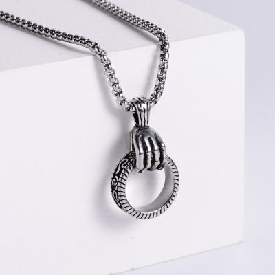 China 2021 New Hip Hop Punk Style Gothic Skull Hand Holding Ring Pendant Stainless Steel Necklace for sale