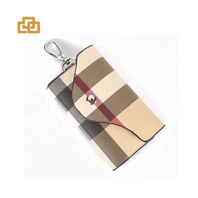 China Fashion Competitive Price Full Grain Cow Leather Car Bag Key Chain With Band Pattern for sale