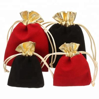 China Small Recyclable Black Velvet Pouch With Gold Drawstring Toy Combs Gifts Packing Bags for sale