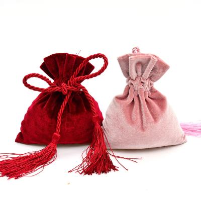 China High Grade Recyclable Tassel Velvet Drawstring Bags Christmas Supplies Packaging Gift Bag For Perfume Oil Candy Jewelry Bags for sale