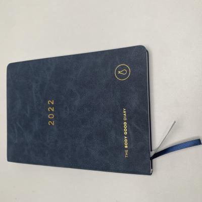 China 2022 high quality custom logo colored notebook a5 printing diary hardcover book the good body diary planner for sale