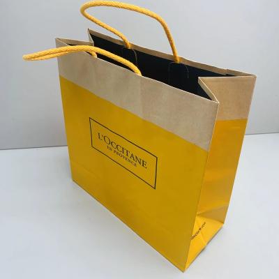 China Recyclable Wholesale Custom Logo Folded Gift Bags Colorful Paper Shopping Bags Kraft Paper Bags for sale