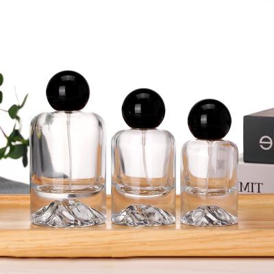 China Round 100ml Round 100ml Clear Glass Perfume Bottle Perfume Bottle Packaging Eco-friendly Empty Luxury Black Atomizer Spray Bottle for sale