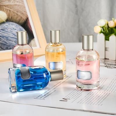 China Eco-friendly Empty Silver Perfume Bottle Cap Cylinder Glass Perfume Bottle 50ml 100ml Perfume Spray Glass Bottles For Women Men for sale