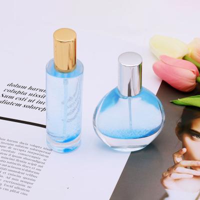 China Eco-friendly Round 50ml 30ml Cylinder Spray Glass Perfume Bottle Transparent Perfume Bottle for sale