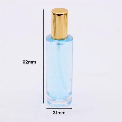 China 30ml Glass Empty Round Cosmetic Bottle Eco-friendly Spray Packaging Clear Glass Spray Perfume Bottle for sale