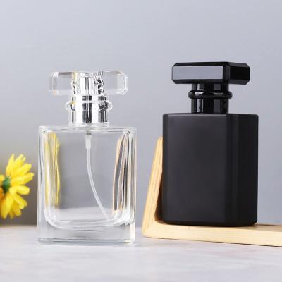 China Factory Price Luxury Matte Frosted Black Eco-Friendly Custom 30ml 100ml Men's Perfume Spray Pump Refillable Glass Bottle for sale